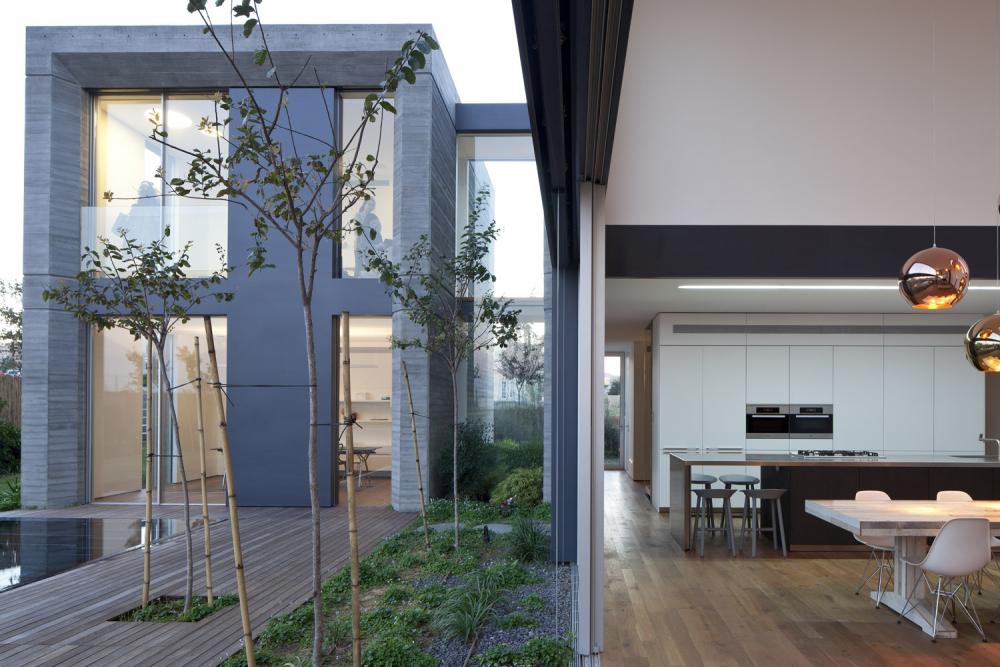 פרקט פרוקים, מטבח נירוסטה, בטון חשוף ופלדה כהה