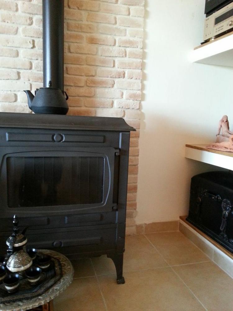 חיפוי לבנים לקיר קמין