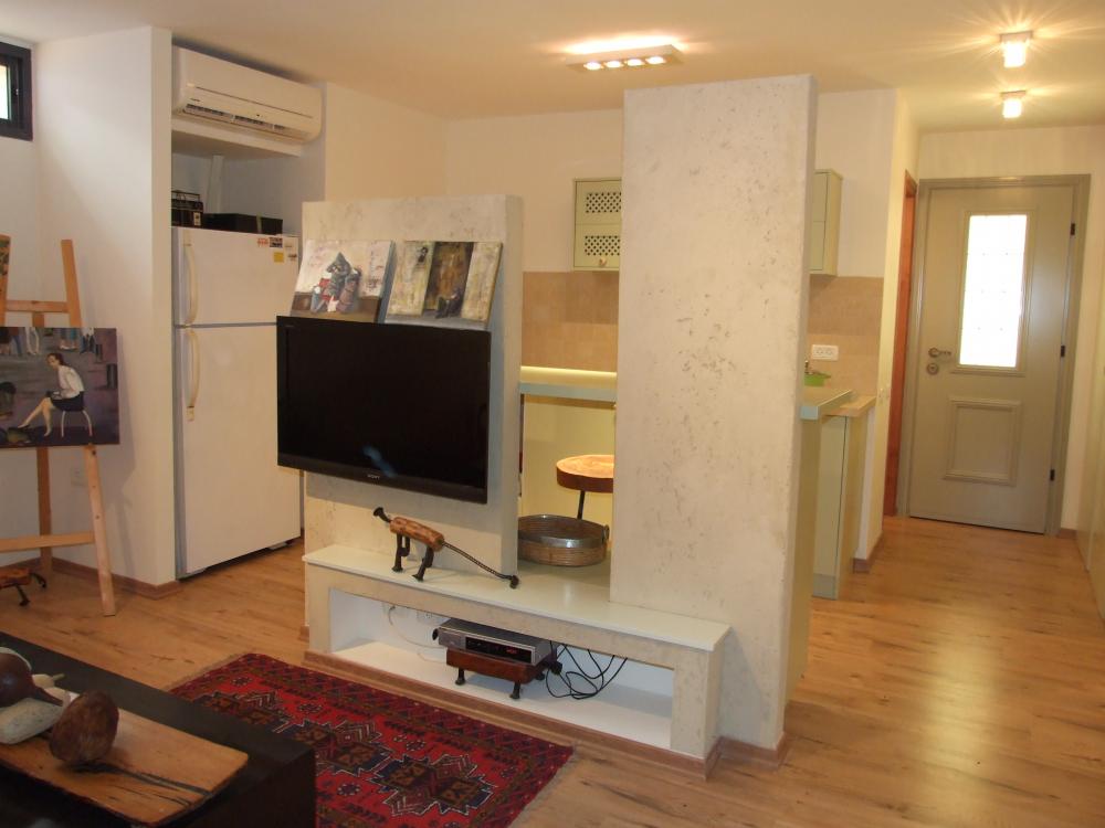 קיר TV מחופה בטיח וגה