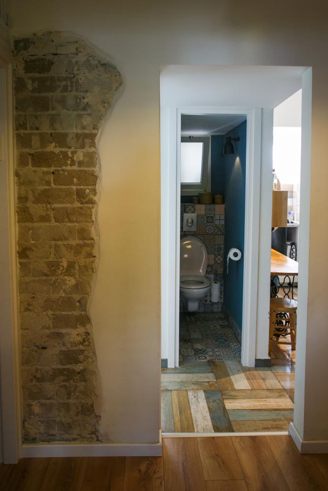 קיר בריקים שנחשף ושימרנו